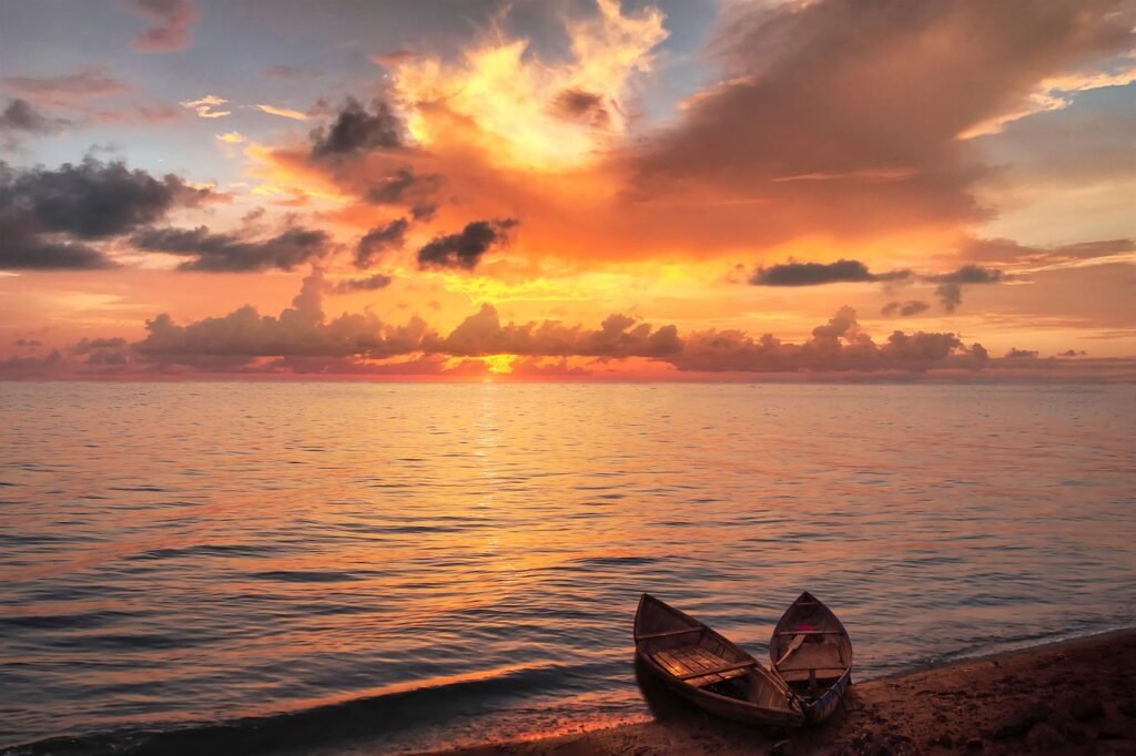 Why the World Can’t Look Away from the Indian Ocean lake, sunset, boats, landscape, clouds, sundown, twilight, dusk, nature, lake, sunset, sunset, sunset, sunset, sunset